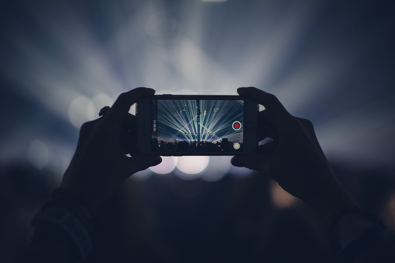 Iphone, concert, lights — Experience Real Casino Energy When You Start Playing Baccarat